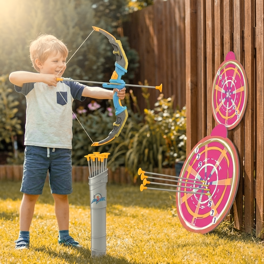 Child playing with bow and arrow toy set using suction cup arrows and target board